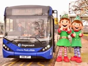 All aboard the Park and Ride bus with ChELFie and ELFie, Chester`s Christmas Elves