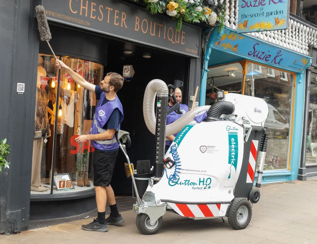 Chester BID Maintenance Operatives cleaning store fronts.