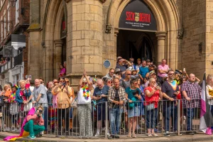 crowds of people waiting on pepper street during chester pride 2024