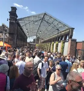 A group of people drinking beer