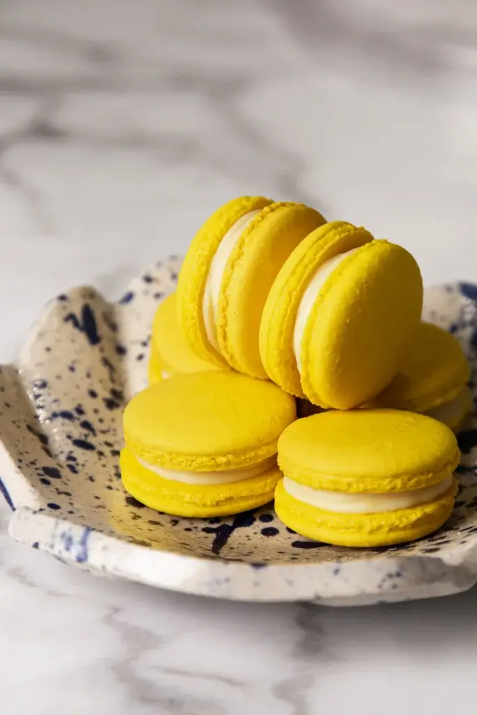 Yellow Macaroons on a plate