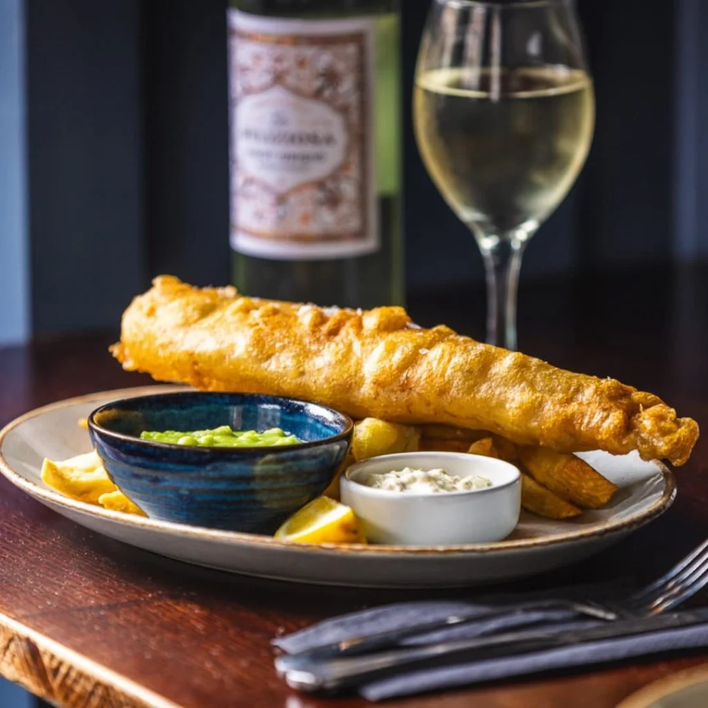 Fish and Chips and glass of wine