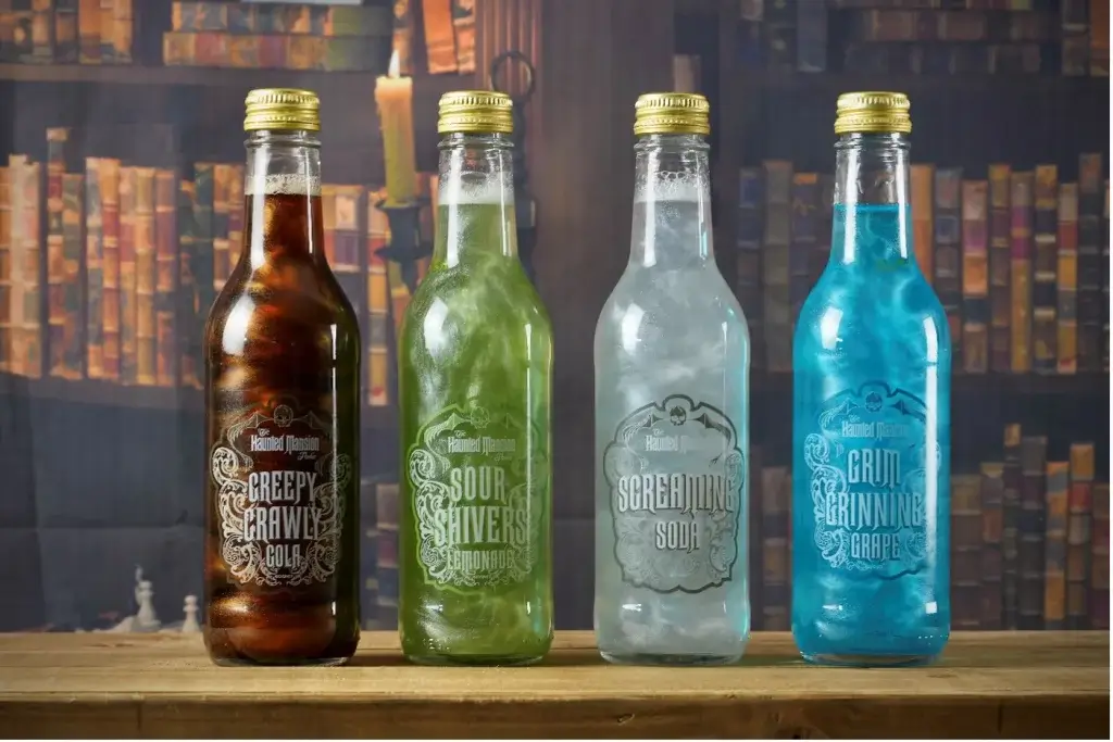 Four Drinks with a marble effect, one being brown, green, silver and blue