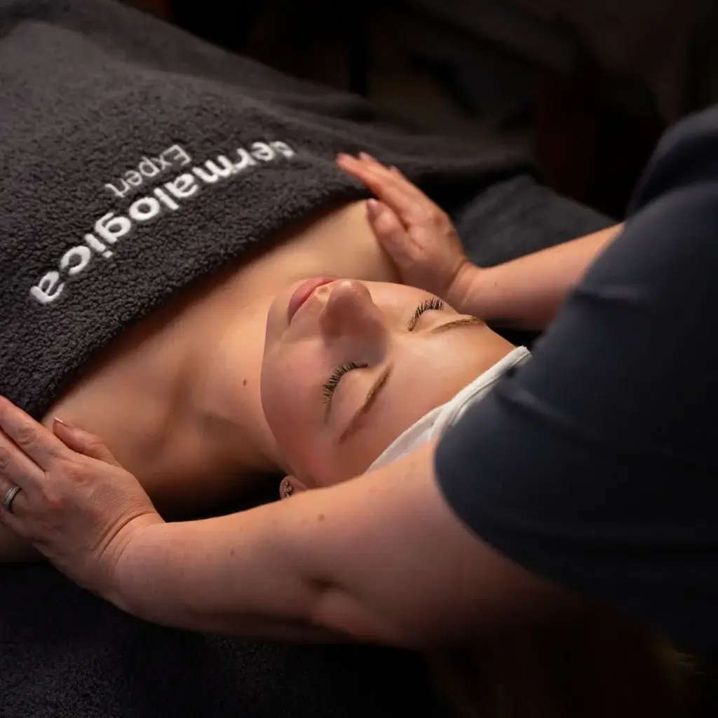 a woman getting a shoulder massage